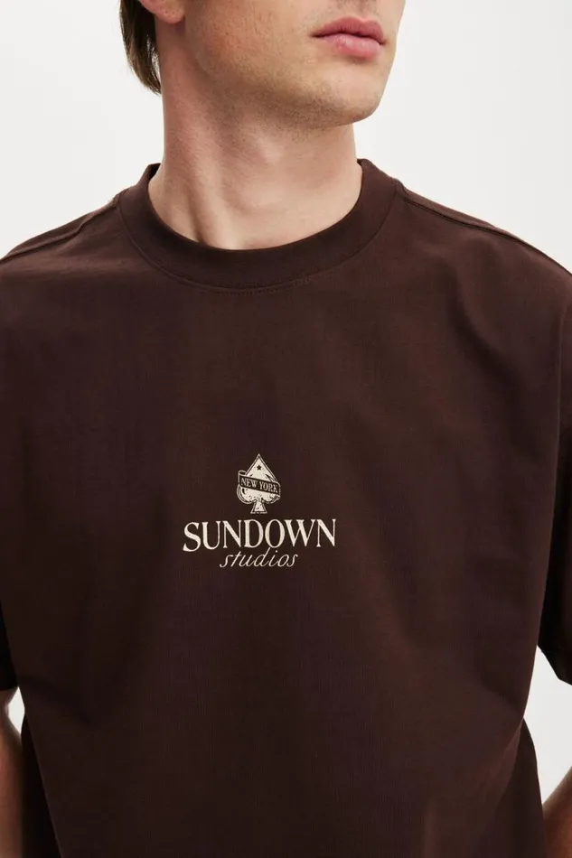 Cotton On Tees and Tanks Box Fit Graphic TShirt Dark Oaksundown Studios 8211 Men Cotton On Tees and Tanks Box Fit Graphic TShirt Dark Oaksundown Studios 8211 Men